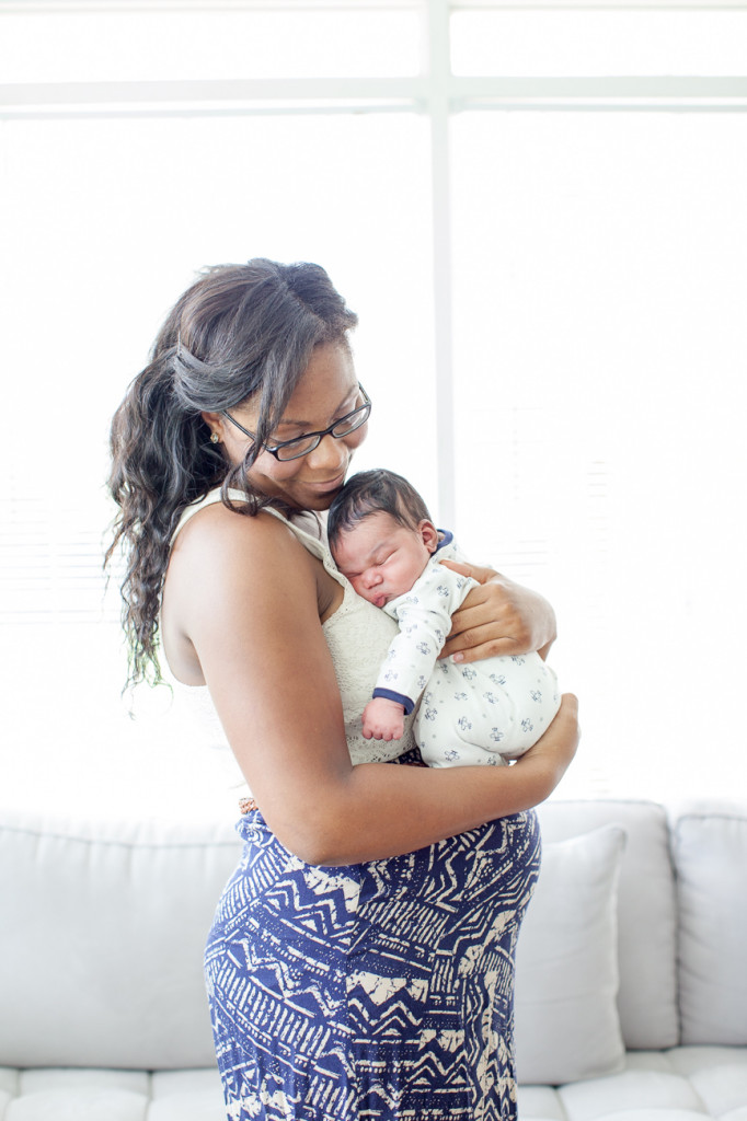 Orlando Lifestyle Newborn Photography Mom holding 4 day old baby
